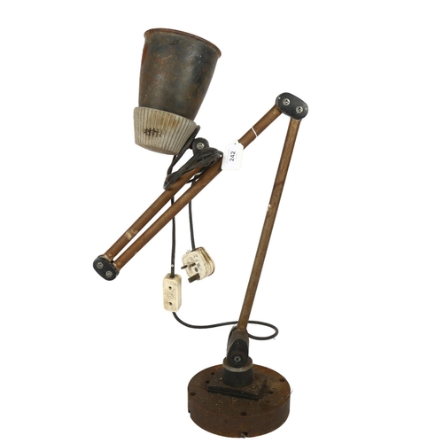 242 - A Vintage industrial anglepoise lamp with cast-iron base