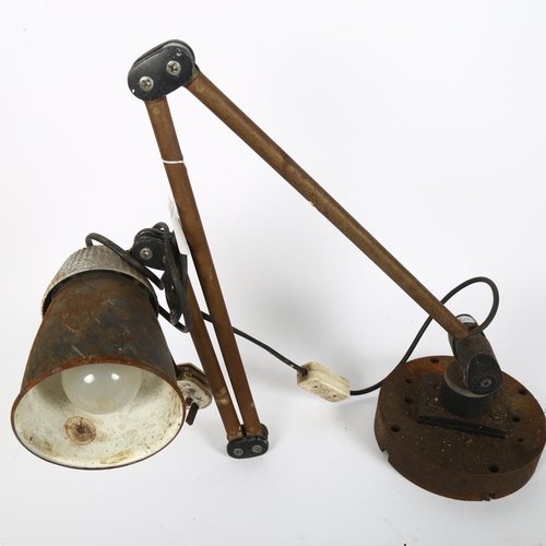 242 - A Vintage industrial anglepoise lamp with cast-iron base