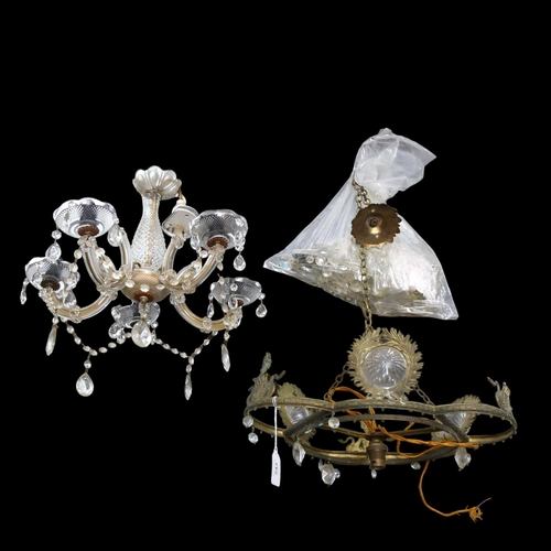 243 - A pressed metal chandelier with mythical bird decoration, and associated glass lustres, drop excludi... 