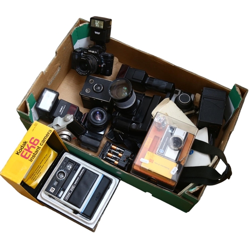 249 - A quantity of Vintage cameras and associated equipment, including a boxed Kodak instant camera EK6, ... 