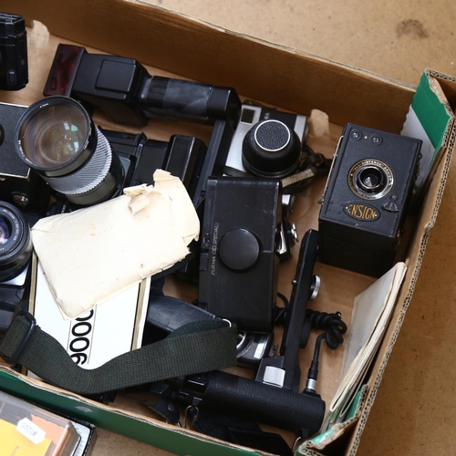 249 - A quantity of Vintage cameras and associated equipment, including a boxed Kodak instant camera EK6, ... 