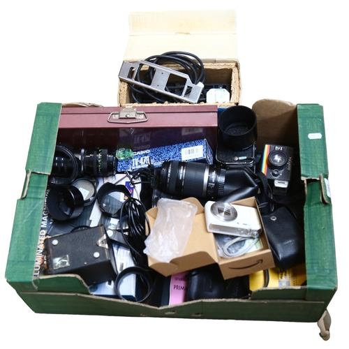 254 - A quantity of Vintage cameras and accessories, including Polaroid, Olympus, Konica etc