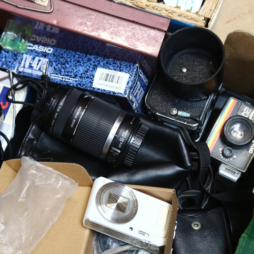 254 - A quantity of Vintage cameras and accessories, including Polaroid, Olympus, Konica etc