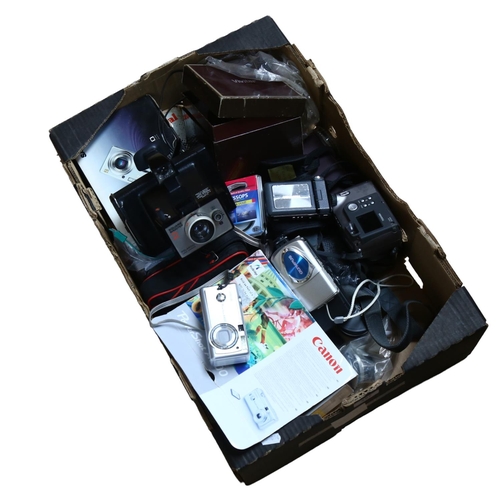 257 - A quantity of of Vintage cameras and associated equipment, including a Sanyo VPC-W800 digital camera... 