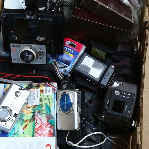 257 - A quantity of of Vintage cameras and associated equipment, including a Sanyo VPC-W800 digital camera... 