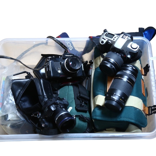 259 - A quantity of Vintage cameras, lenses, and associated equipment, including a Nikon Nikkormat camera,... 