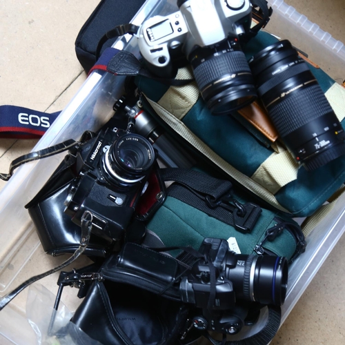 259 - A quantity of Vintage cameras, lenses, and associated equipment, including a Nikon Nikkormat camera,... 