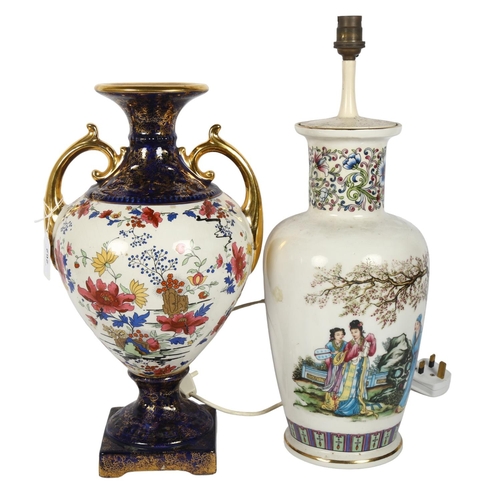 262 - PHOENIX WARE - a Vintage porcelain urn, with cobalt blue and gold gilt floral decoration to the base... 