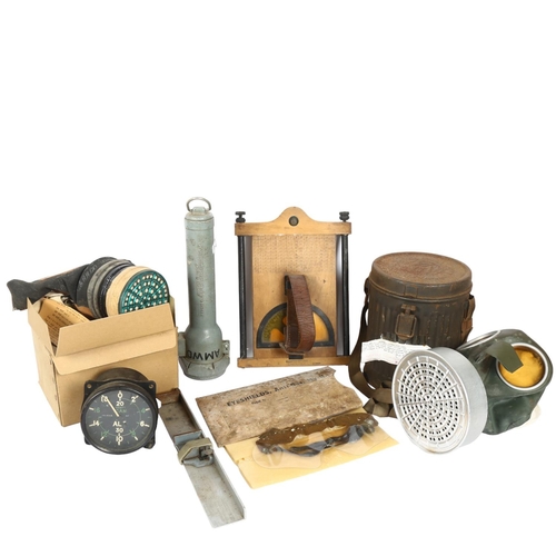 265 - A quantity of World War II equipment and memorabilia, including an Air Ministry Works Department (AM... 