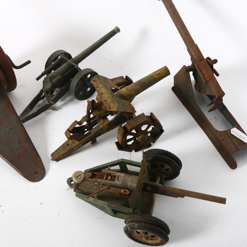 266 - A group of Vintage tinplate toy cannons, largest length 36cm (5)