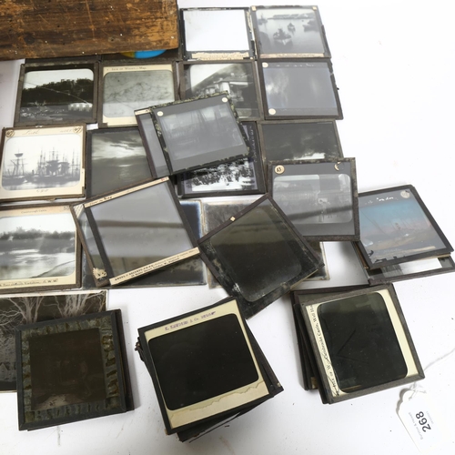 268 - A box of Antique glass magic lantern slides, slides cover various subjects including many nautical a... 