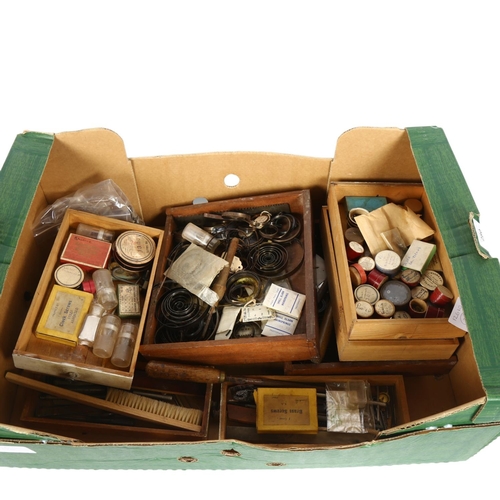 280 - A quantity of Vintage clock parts and tools, including various springs and associated parts for move... 