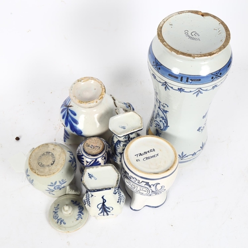 281 - A group of European blue and white tin glazed pottery, including large drug jar, water jug, Delft va... 