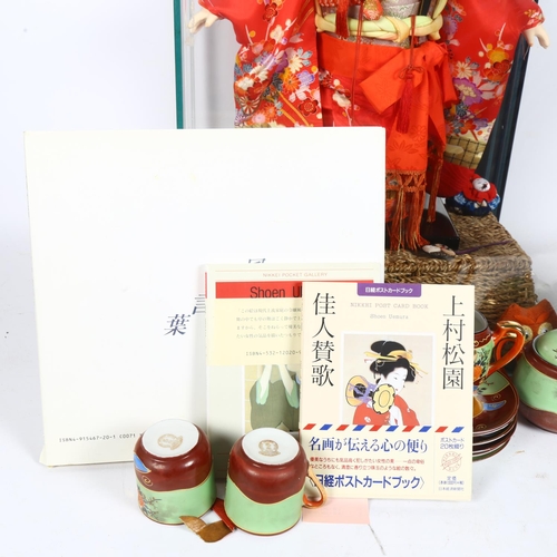 282 - A Japanese Ichimatsu doll, in a glass display case, case height 60cm, and a quantity of genuine Samu... 