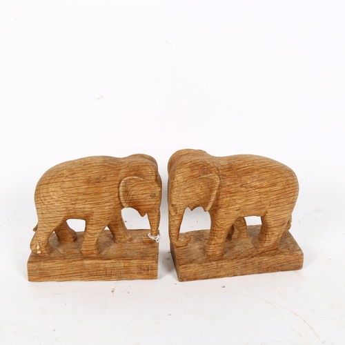 286 - A Vintage hardwood knobkerrie, L50cm, and a pair of wooden elephant figurines