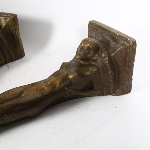 292 - A pair of early 20th century nude female gilded plaster wall-hanging brackets, L45cm