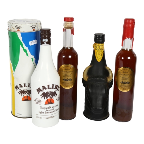 298 - A 70cl bottle of Malibu, in original display packaging, 2 bottles of French apricot aperitif, and a ... 