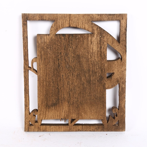 306 - A carved wood panel, H23cm