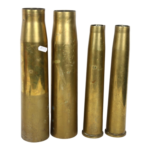 313 - 2 Second World War cannon shell cases, H31cm, and 2 taller examples lacking bases