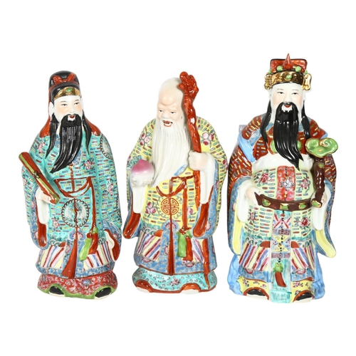 321 - A set of 3 Chinese porcelain deities representing prosperity, status and longevity, largest height 3... 