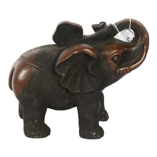 326 - A large Indian bronze elephant, with engraved decoration, H26cm