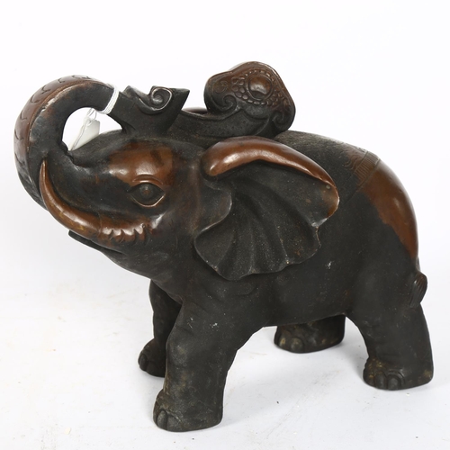 326 - A large Indian bronze elephant, with engraved decoration, H26cm