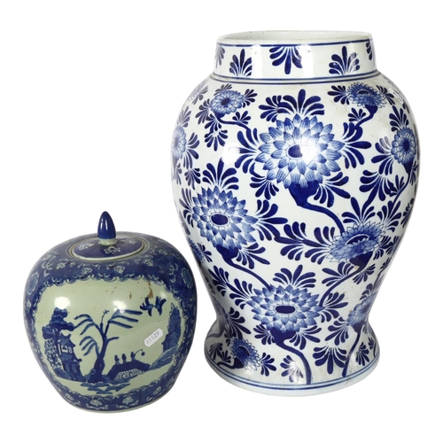 332 - An Oriental porcelain blue and white baluster vase, 45cm, and a Chinese jar and cover with painted s... 