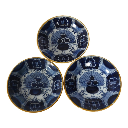 335 - A set of 3 blue and white Antique painted pottery dishes, 16cm