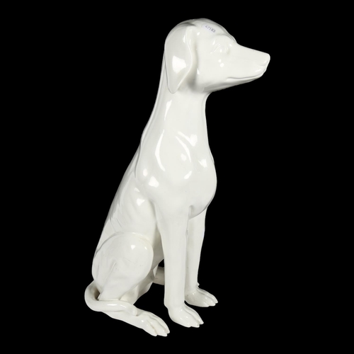 347 - An Italian porcelain sculpture of a hound, H56cm