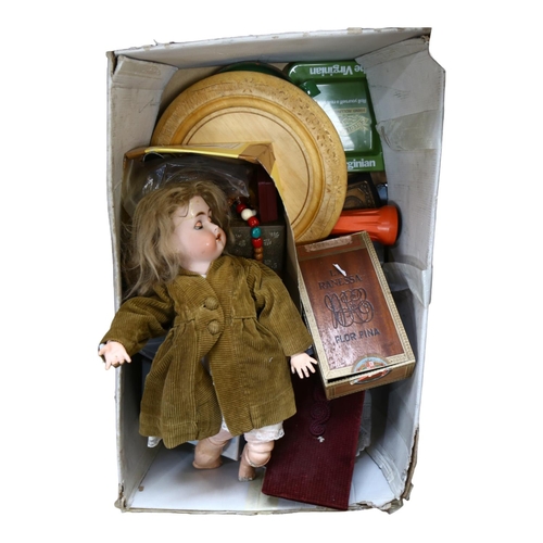 368 - A box containing Simon & Halbig porcelain-headed doll, table linen, mirror, costume jewellery, cigar... 