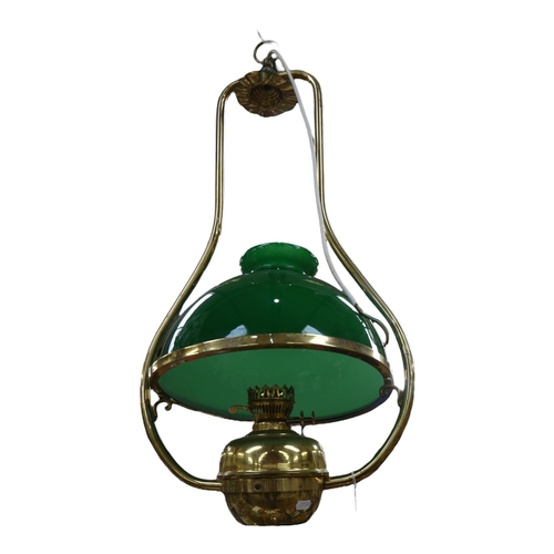 372 - A brass oil lamp design ceiling light fitting, with green glass shade, 42cm across