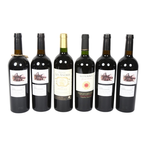 408 - 5 bottles of Portuguese Douro Grande Reserva, and a bottle of Bordeaux 2010