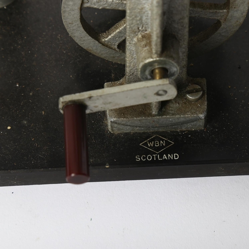 414 - A Wimshurst electrostatic machine, stamped WBN Scotland, L30cm