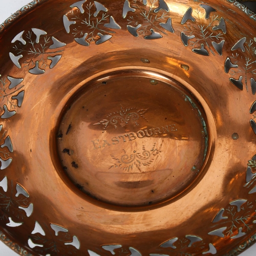 416 - A copper bowl with pierced decoration, stamped Eastbourne, 20cm, an Ornamental Edwardian shoe, pierc... 