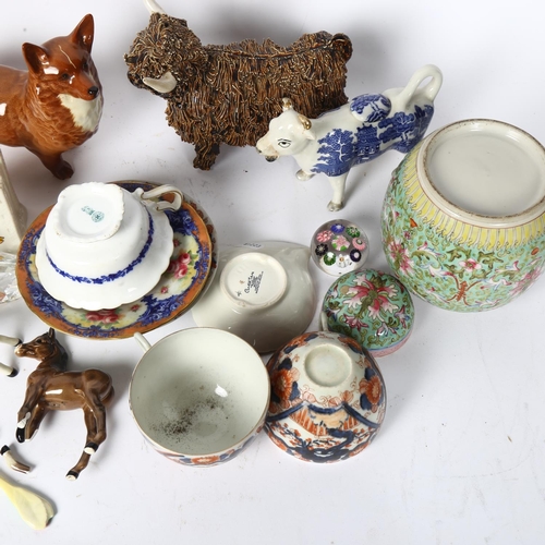 423 - Chinese cups and saucers, a Doulton cabinet cup and saucer, ginger jar, Beswick Corgi, Highland cow,... 