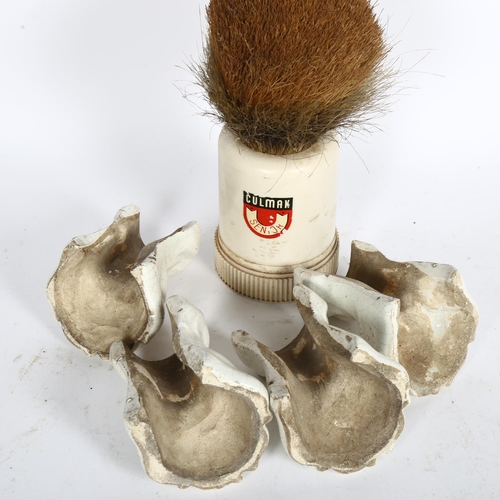 473 - A set of 4 lion paw ceramic bath feet, H10.5cm, and a Culmak Senior shaving style brush