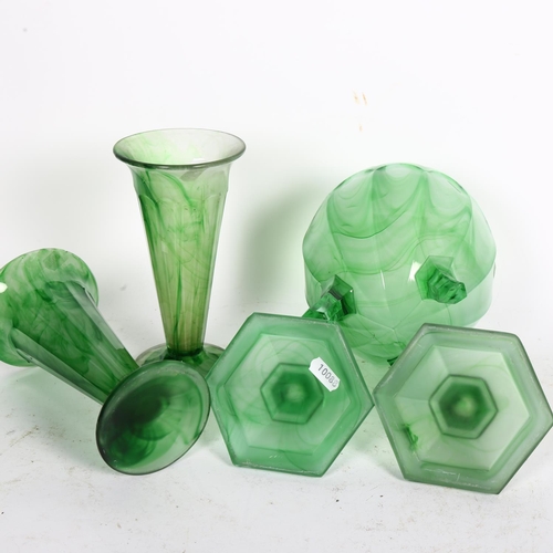 487 - Green cloud glass flower bowl, a pair of vases, 18.5cm, and candlesticks