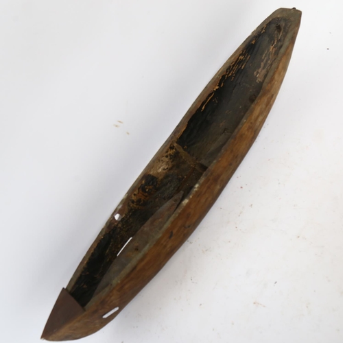 496 - A dug-out model canoe L62cm