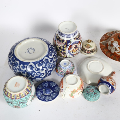 509 - A Japanese Kutani dish and cover, Chinese jars and covers, Imari bottle vase, and a Staffordshire cu... 