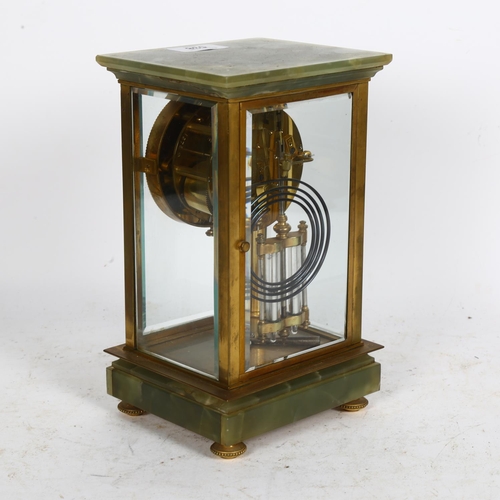 538 - An onyx and brass clock, with mercury pendulum and 2-train movement, H24cm