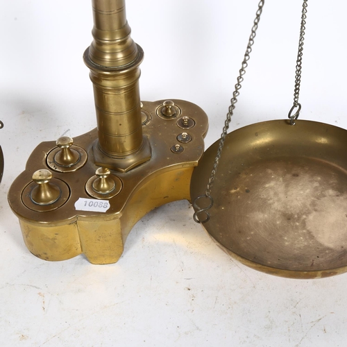 540 - A large pair of Antique brass Continental scales with fitted weights in base, H58cm