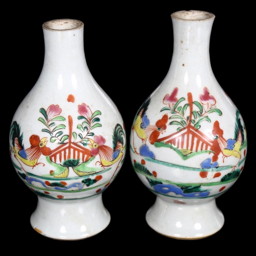 566 - A pair of Chinese vases, with design of cockerels, H14.5cm