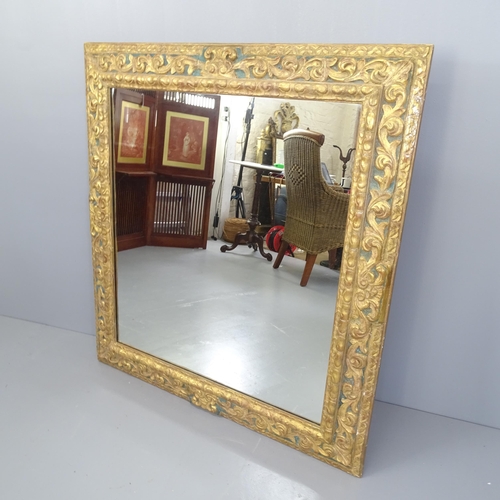 2234 - A continental gilt painted wall mirror, with applied carved decoration. 96x103x6cm.