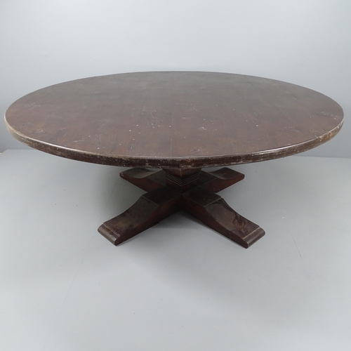 2149 - An antique oak two-section circular dining table. 187x78cm