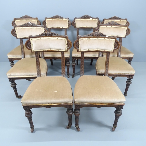 2150 - A set of eight 19th century carved oak and upholstered dining chairs.