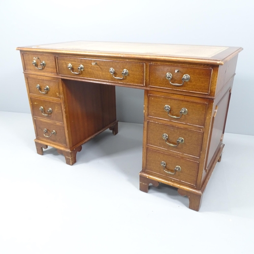 2158 - An Edwardian mahogany twin pedestal writing desk, with nine fitted drawers. Skiver A/F. Overall 123x... 