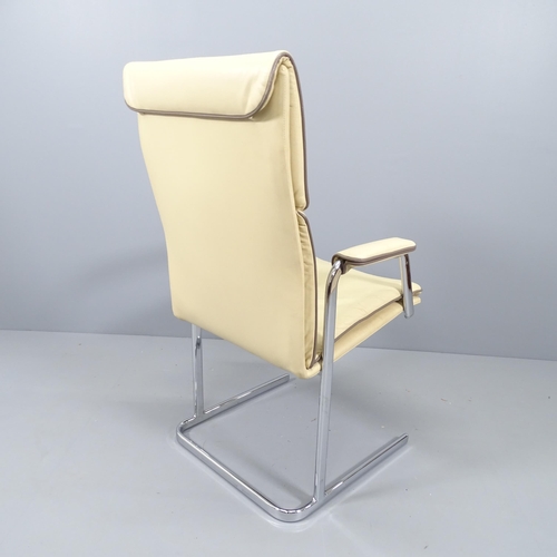 2162 - A mid-century cream leather upholstered Bauhaus style lounge chair on chrome base.