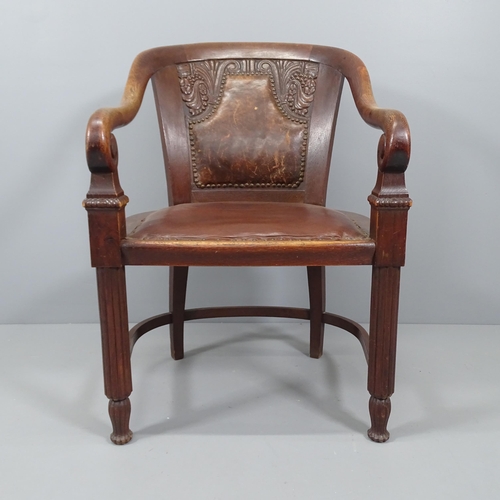 2174 - An early 20th century Austrian stylised carved oak desk chair.