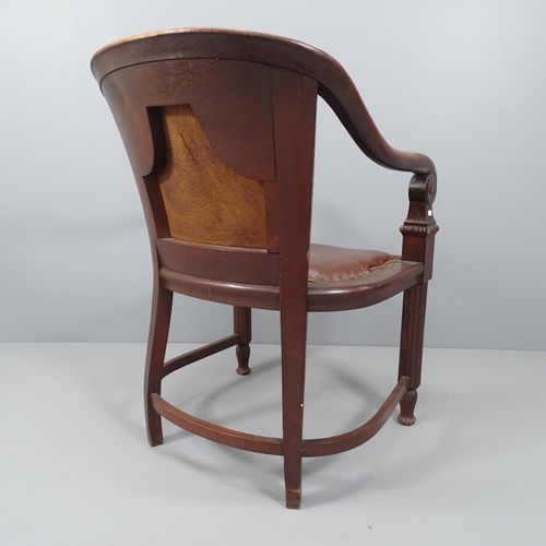 2174 - An early 20th century Austrian stylised carved oak desk chair.