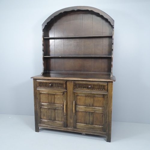 2189 - A late 20th century oak two-section dome-top dresser, with carved and panelled decoration. 123x190x5... 